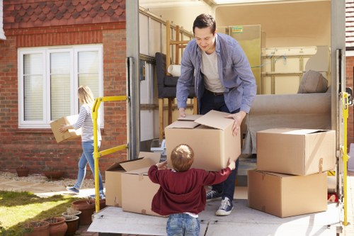 Professional flat removals in St Lukes with boxes and moving van