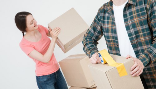 Office removals in St Lukes with packed boxes and organized workspace