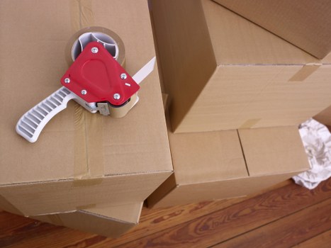 Careful handling of furniture during a small removals service in St Lukes